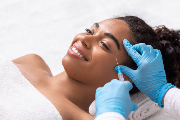vitamin injection given by dermatologist to happy patient